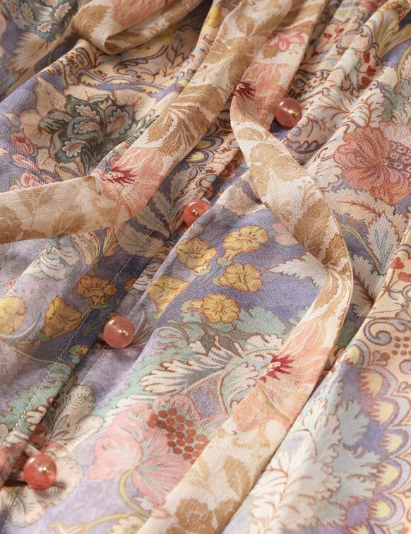 Blouse à cordons Rebellion à motif floral assemblé en ligne Blouse à cordons Rebellion à motif floral assemblé en ligne