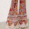 Pantalon évasé froncé Luna à motif floral multicolore en ligne Pantalon évasé froncé Luna à motif floral multicolore en ligne