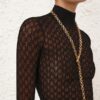 Pull à col roulé en maille dentelle noir en ligne Pull à col roulé en maille dentelle noir en ligne